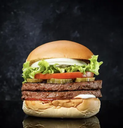 A finished restaurant burger photographed for a menu